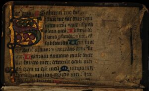 a very old book with some writing on it
