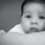 grayscale portrait photography of baby