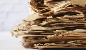 a close up of a pile of paper on a table