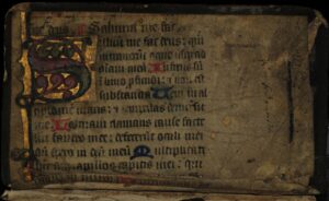 a very old book with some writing on it
